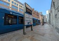 image of tram at tram stop