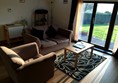 Patio doors with one step access.