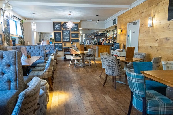 This is the dining room showing that there is plenty of space for wheelchairs