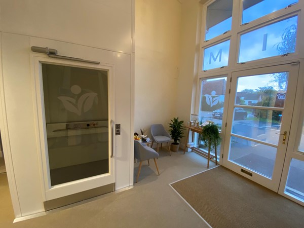 Here is the waiting area and lift to access the gym upstairs.