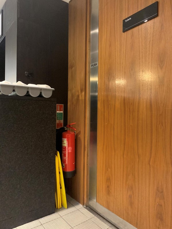 Door to toilet corridor