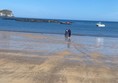 Picture of people by the sea on North Berwick beach