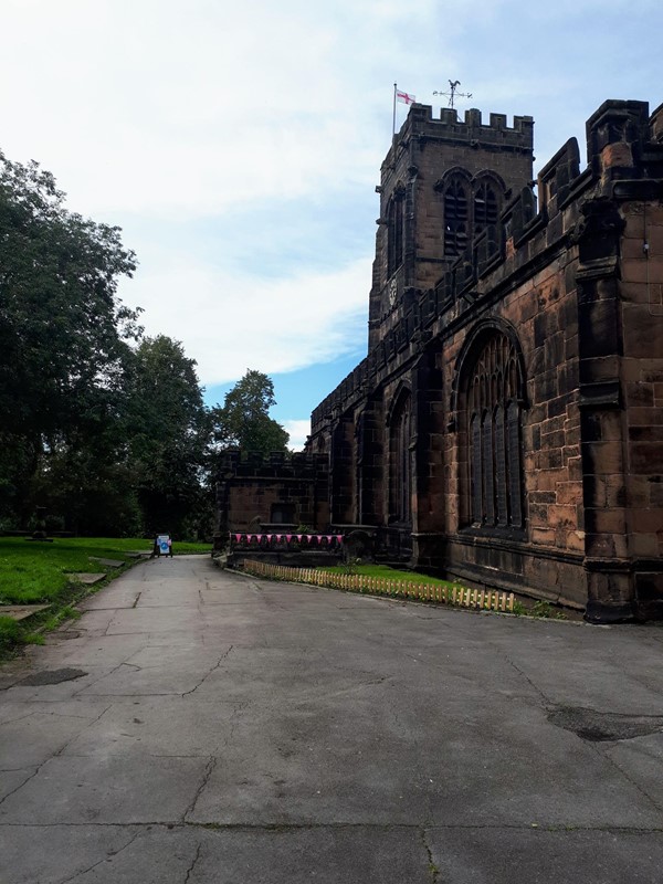 Outside view of church and path from disabled parking area