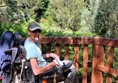 Powerchair user on a wooden platform