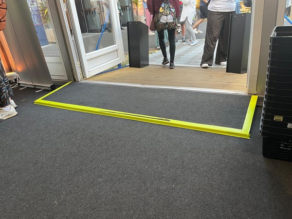 Image of the bump over the doorway of the bookshop.