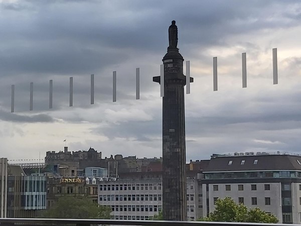 Close up view view of St Andrew's Square and Edinburgh Castle