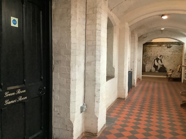 Corridor with the door to the games room