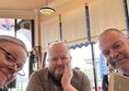 Image of three people at a table
