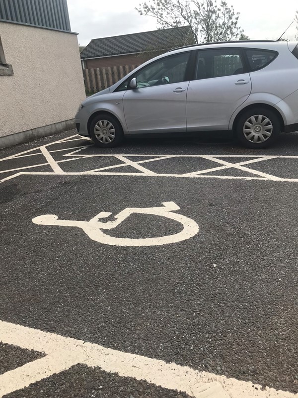 Disabled parking outside hall