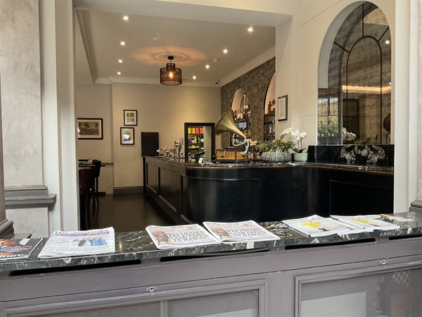 Image of the papers in a bar.