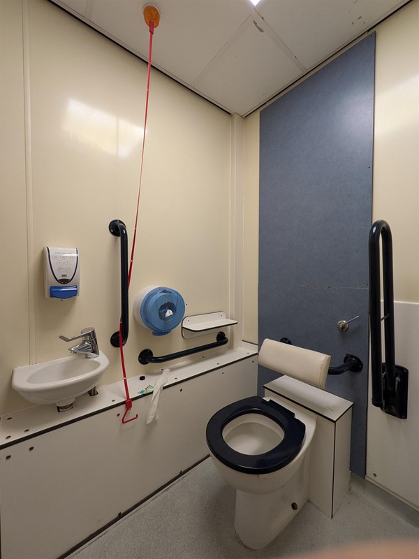 image of sink and toilet in accessible bathroom Jubilee wing