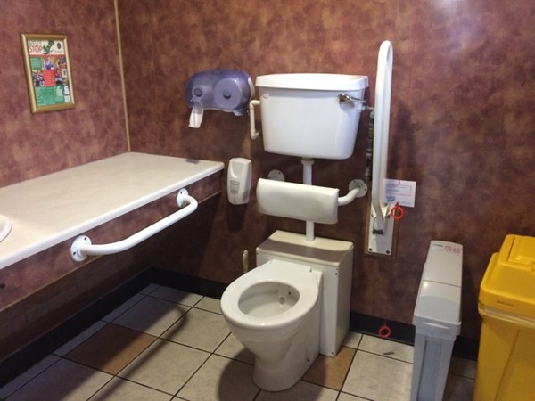 The accessible toilet with changing bench.
