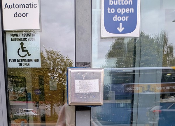 Image of button to open the front doors