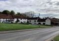 Road leading to The Queen and Castle pub