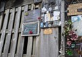 A sign marking Ianto's sacrifice in Torchwood.
