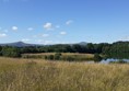 View from the top with East and West Lomond hills in the distance