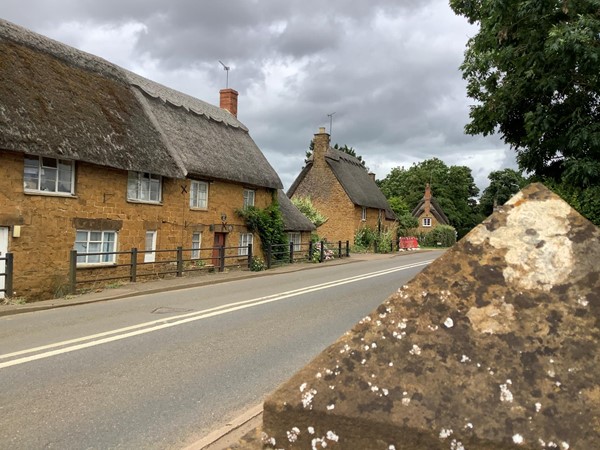 Wroxton village main A422 road as entering village from Banbury direction