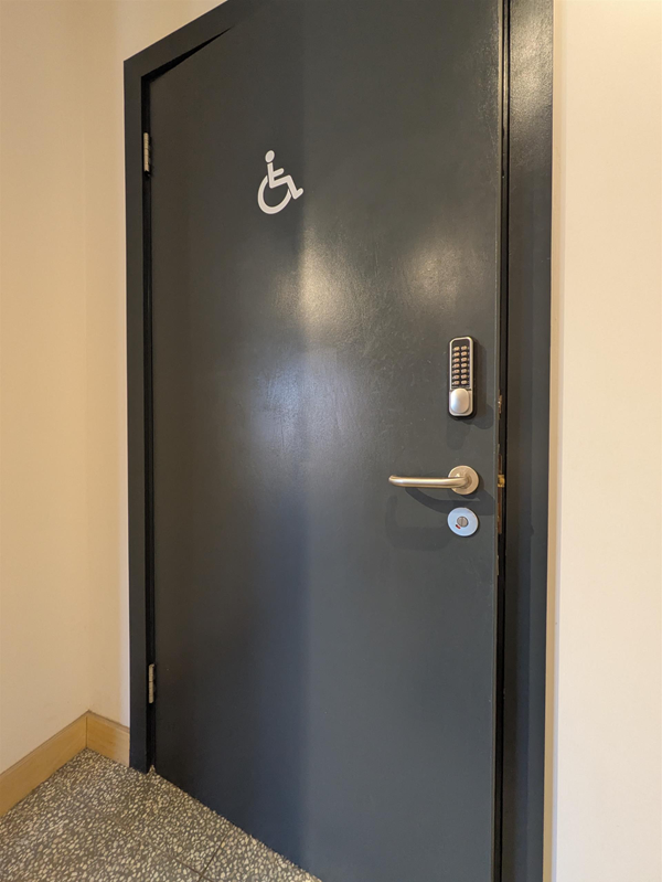 Image of door to accessible toilet from the outside