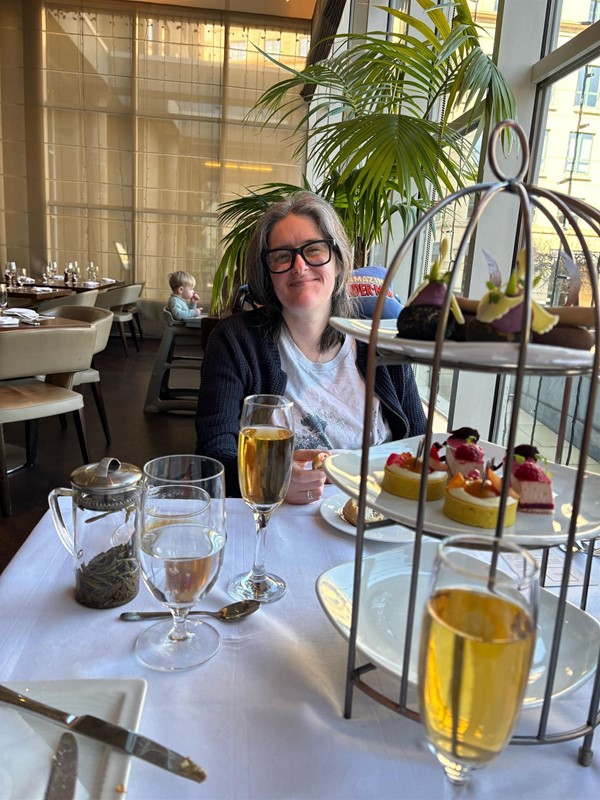 Image of a person with cakes