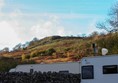 View towards the top of the site with beautiful hills in the background.