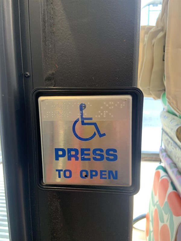 image of the door open button on the inside of the main door