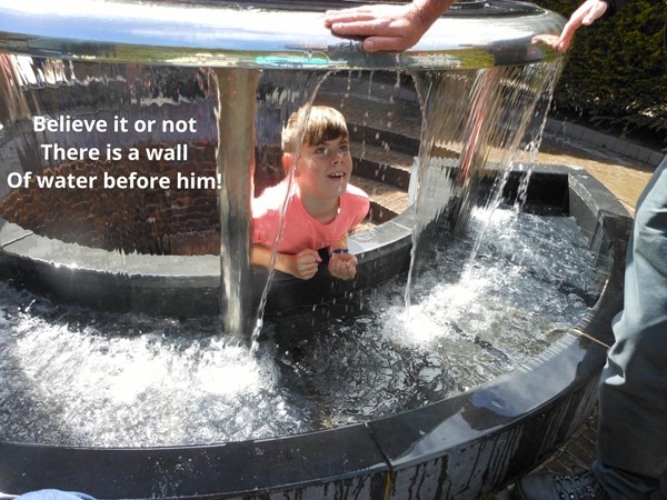 Believe it or not there is a wall of water before him