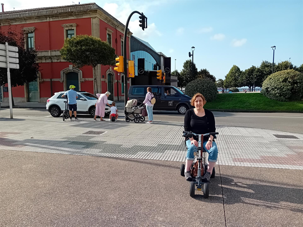 Red building in the background is the Asturias Railway Museum in Gijón, with Poniente accessible beach further back behind the trees