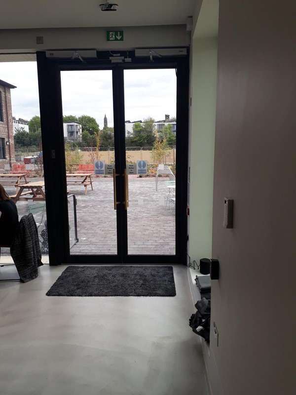Automatic doors to courtyard