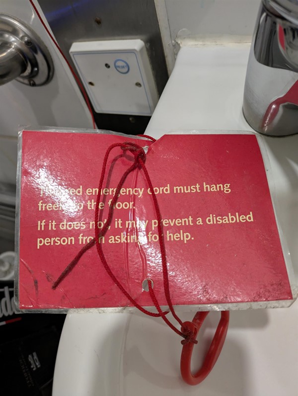 Image of a red cord card that was made by someone other that Euan’s Guide