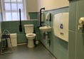 View of accessible toilet from door