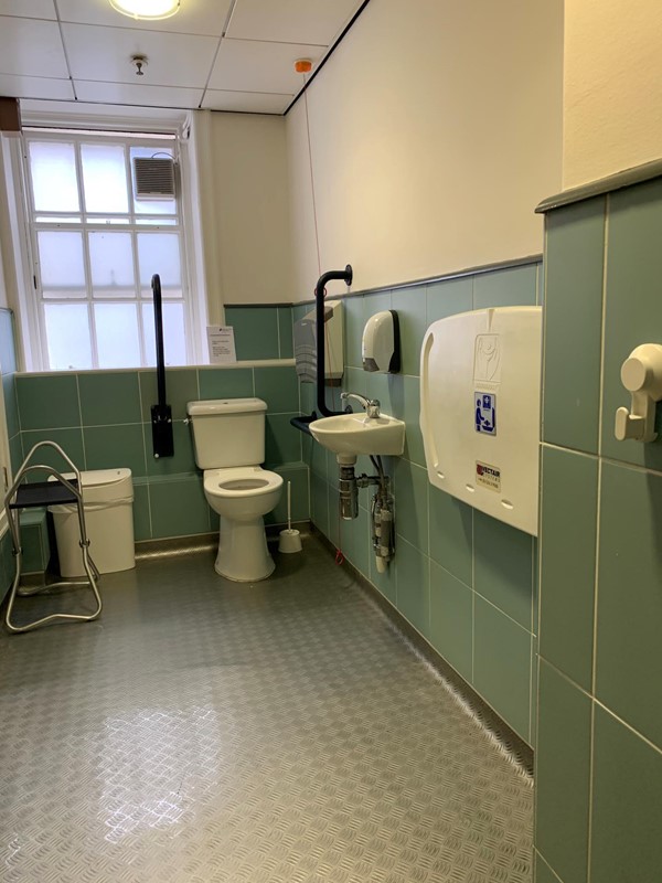 View of accessible toilet from door