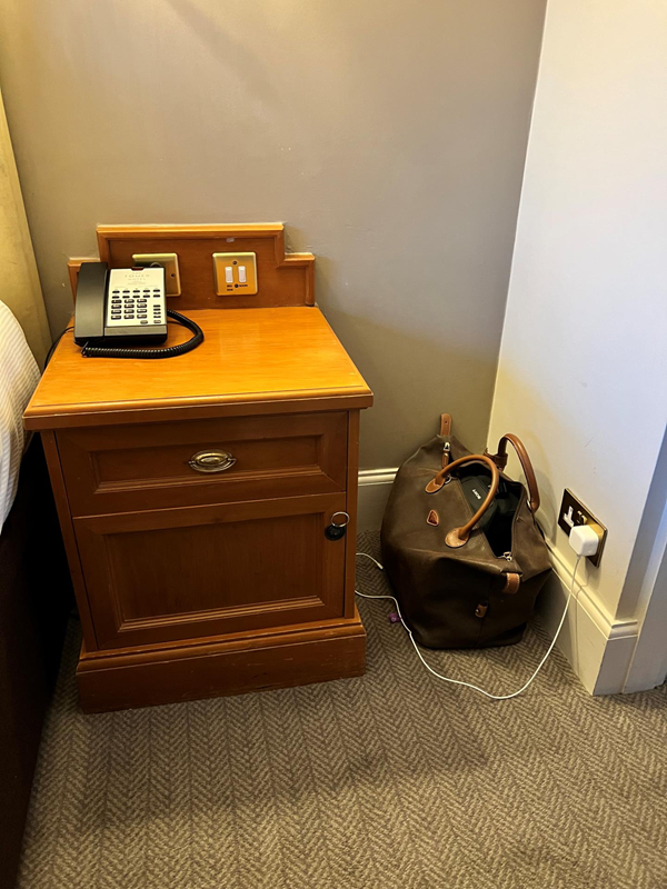 Plug points next to the bed in room 101