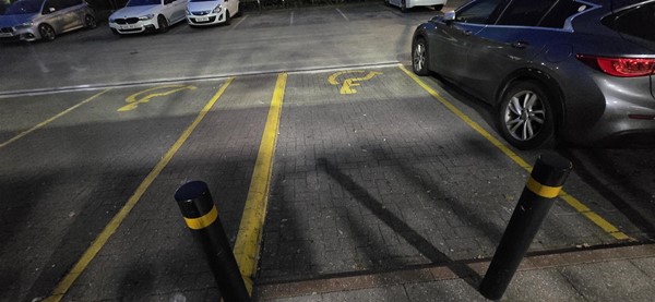 Image of two disabled parking spaces