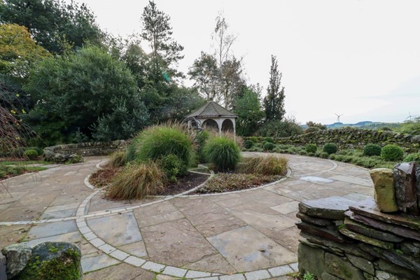Contemplation garden with smooth paved surface.