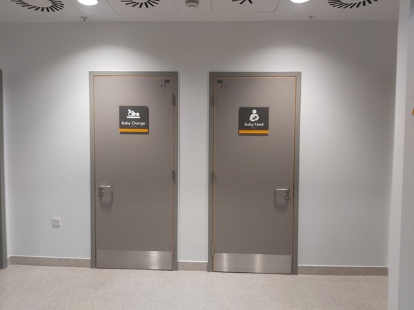 Picture of baby change and baby feed cubicle doors