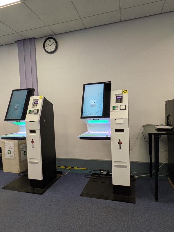 Image of self service checkout terminals