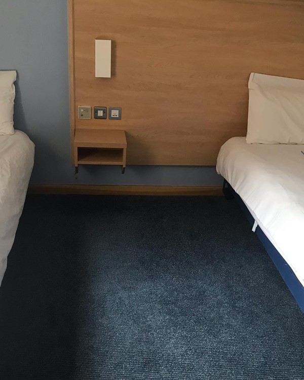 two single beds in hotel room