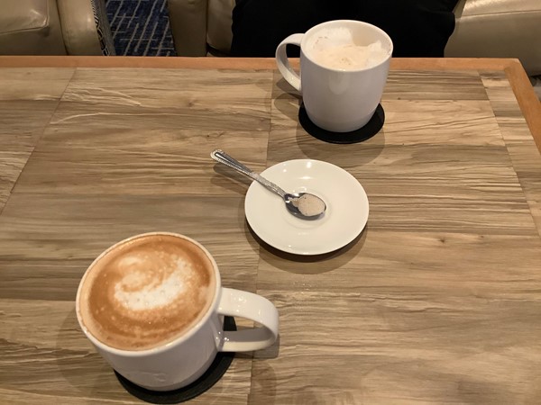 Picture of two cups of coffee on a table