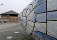 Image of The Big Fish showing images and text on the blue and white scales