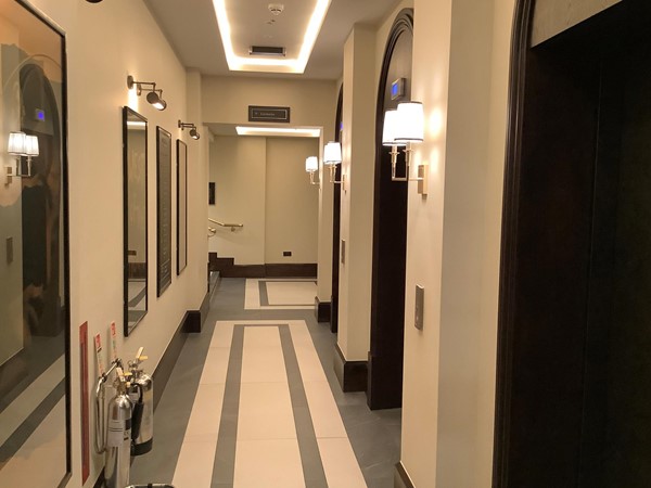 Corridor to accessible toilet.