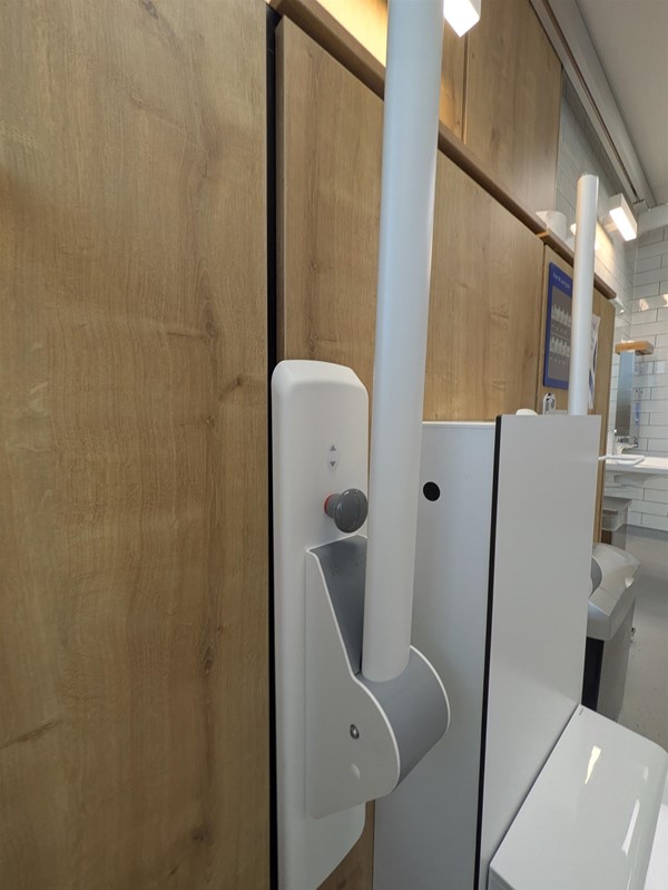 Image of adjustable rails on the toilet