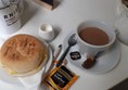 This is what I had: very nice scrambled egg roll, cup of tea. Cost £5.25, which I thought was very reasonable. For the tea, they provided hot water and a tea bag, so I could have it as strong (or as weak) as I liked.