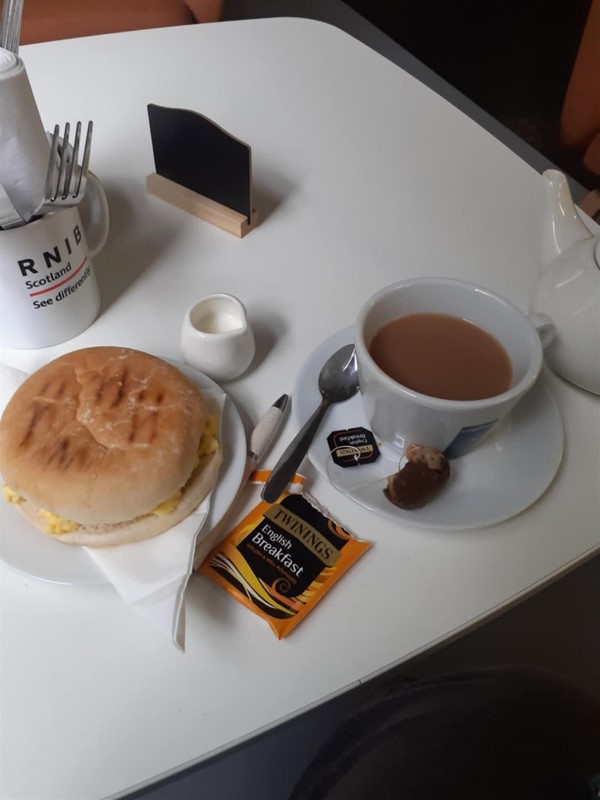 This is what I had: very nice scrambled egg roll, cup of tea. Cost £5.25, which I thought was very reasonable. For the tea, they provided hot water and a tea bag, so I could have it as strong (or as weak) as I liked.