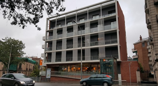MICs Sant Jordi exterior photo. Showing metro station outside and ramp access into apartment building.