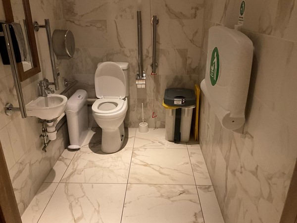 Accessible toilets are very good, spotlessly clean, roomy, and stand just at the far end corner of the restaurant. Modern furnishes and facilities, with grab rails and pull cord.