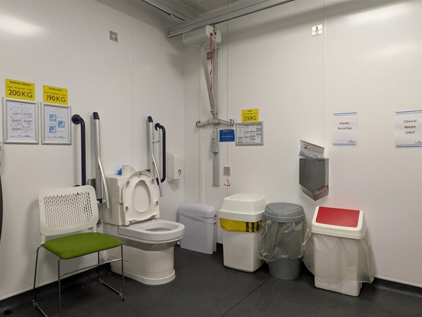Image of Ceiling Track hoist, closomat toilet and bins