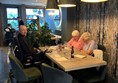 Image of our reviewer sitting at his table in the restaurant.