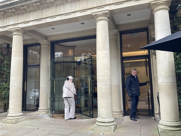 Image of a person standing in an entrance way
