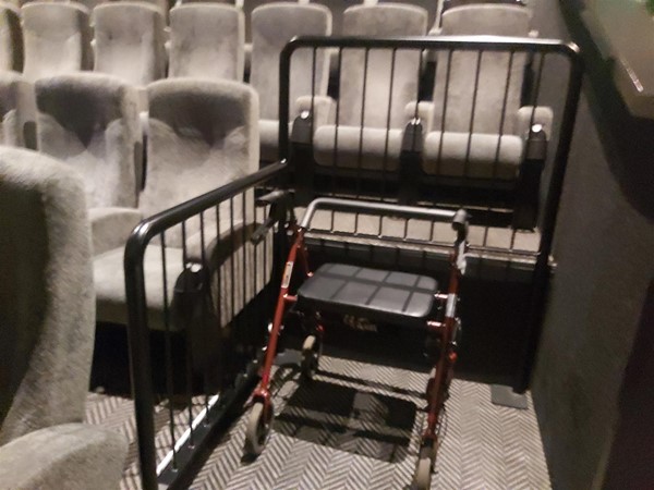 Image of a wheelchair in a theatre