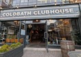 Image of venue exterior, above the door are the words "COLDBATH CLUBHOUSE" - white text on a grey sign.